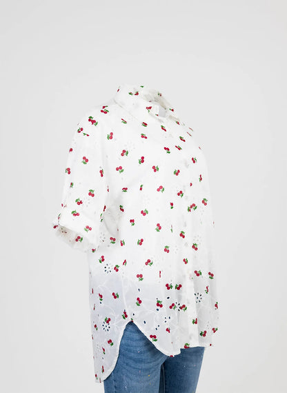 White 100% cotton Cherry Kiss women's summer shirt with short sleeves, cherry print, and eyelet details.