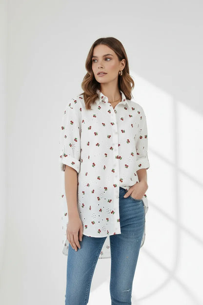 Chic white 100% cotton Cherry Kiss shirt with cherry print, rolled sleeves, and relaxed fit.