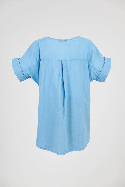 Light blue women's cotton shirt with short, rolled-up sleeves and a relaxed fit, perfect for summer.