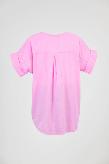 Vibrant pink Bloom Lace 100% cotton short-sleeve shirt with relaxed fit and rolled cuffs.