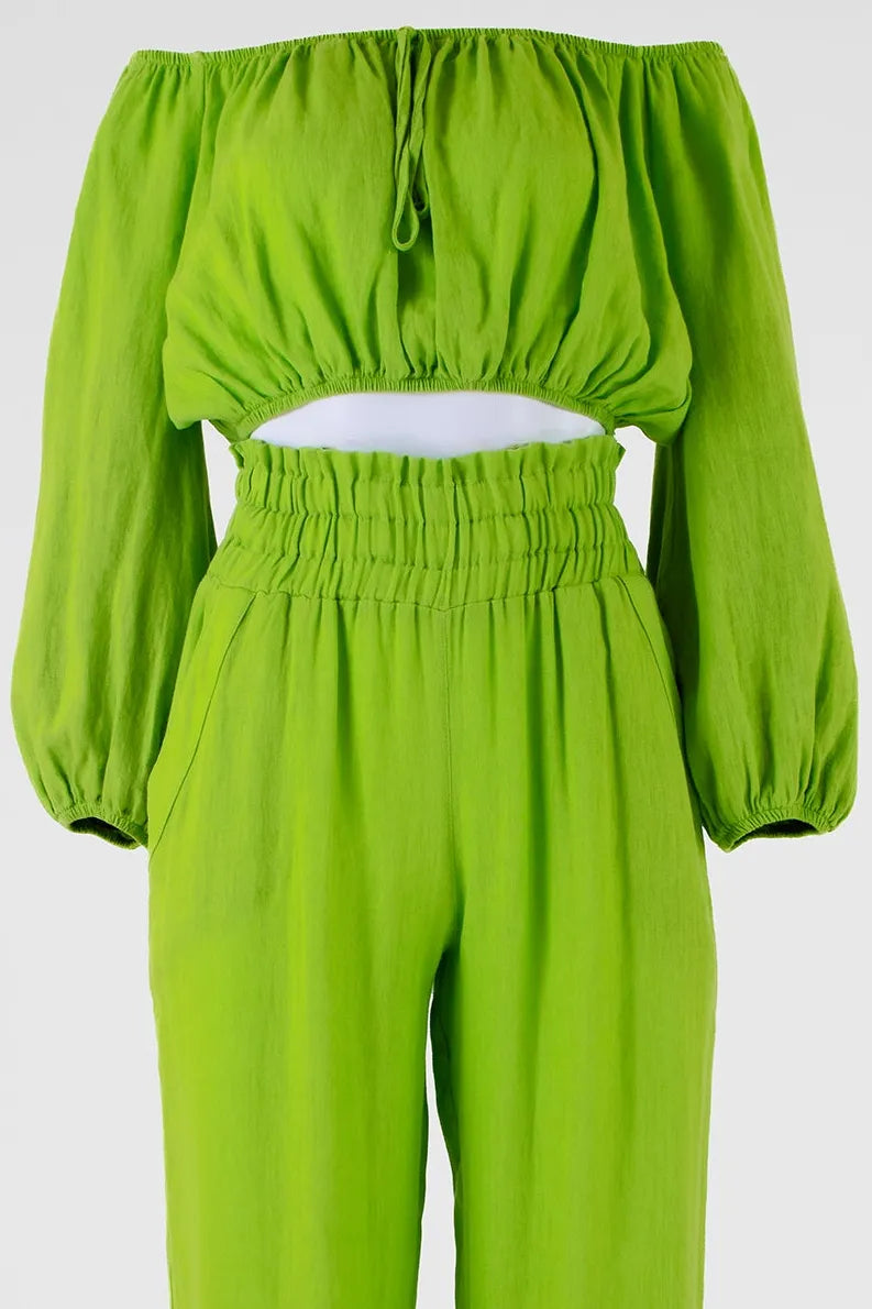 Vibrant green linen off-shoulder top and high-waisted pants set, perfect for summer style.