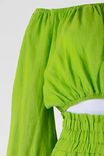 Vibrant green linen off-shoulder top and high-waisted pants set, perfect for summer style.
