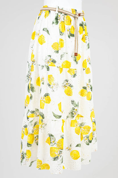 White cotton midi skirt with vibrant lemon print, tiered design, and braided rope belt.