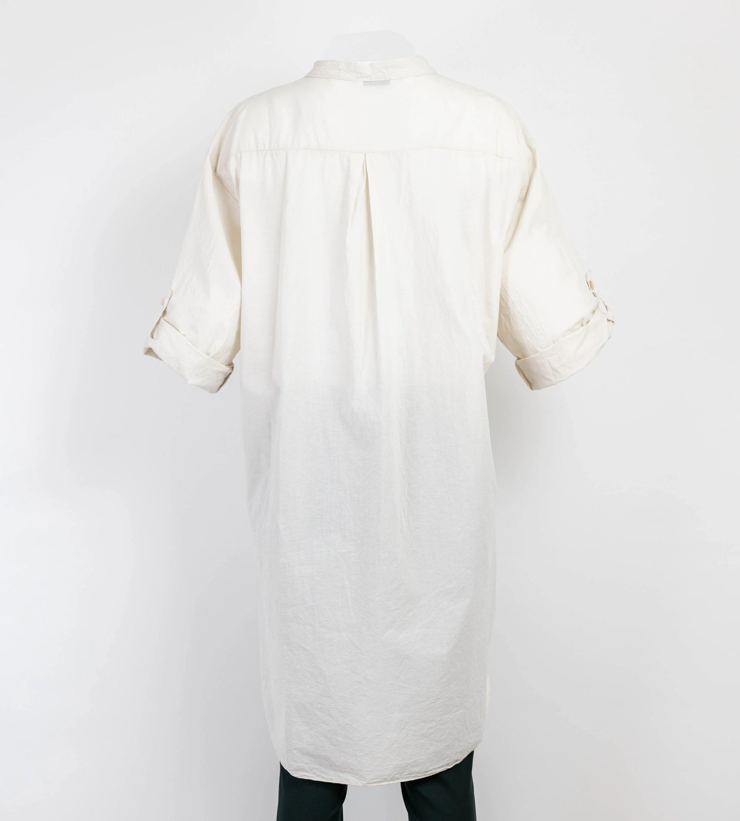 Elegant white 100% cotton long shirt/tunic, loose-fit with rolled 3/4 sleeves, perfect for versatile styling.
