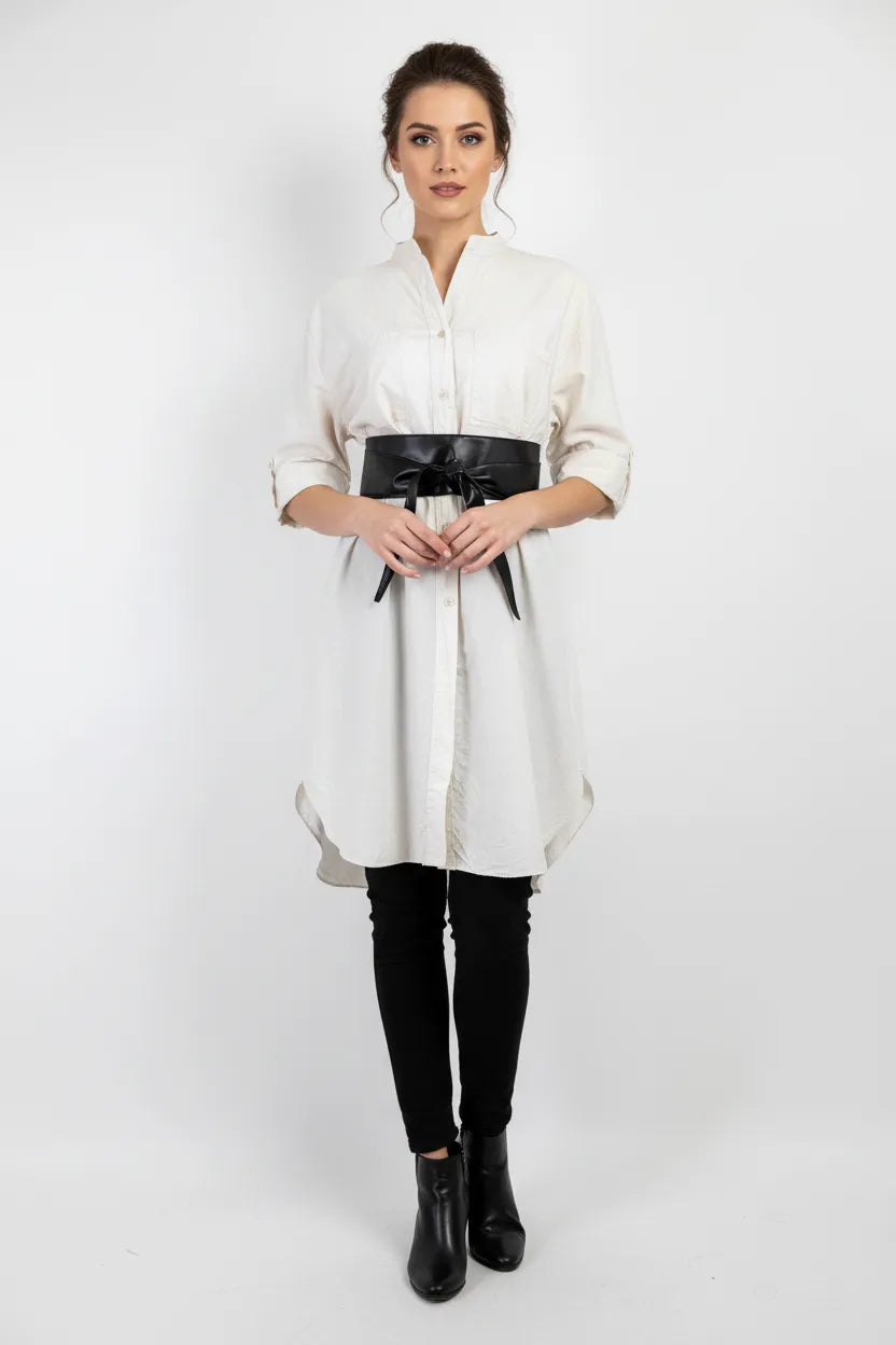 Elegant white 100% cotton long shirt/tunic, styled with a black obi belt, black pants, and boots.