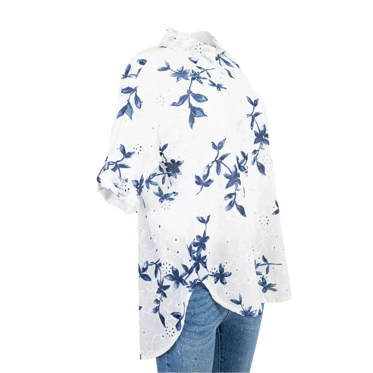 Stylish white cotton blouse with blue floral embroidery, relaxed fit, perfect for summer.