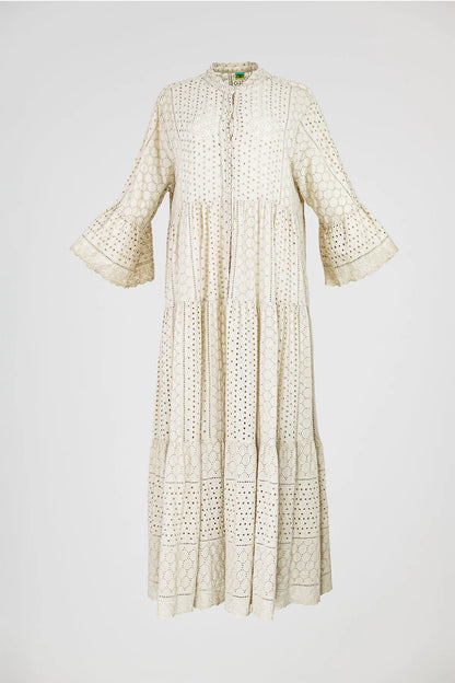 Elegant beige 100% cotton Boho Breeze maxi dress with intricate eyelet embroidery, tiered skirt, and flared sleeves.