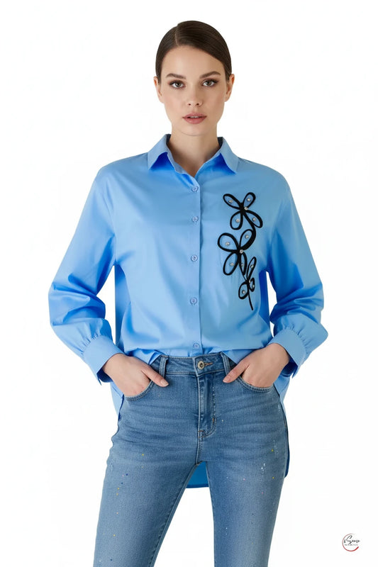 Chic Sofia women's light blue cotton shirt with black 3D floral appliqué and sparkling beads.