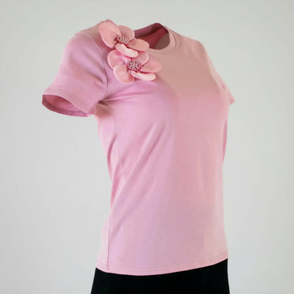 Chic pink women's t-shirt with elegant 3D floral appliques and delicate bead accents on the shoulder.