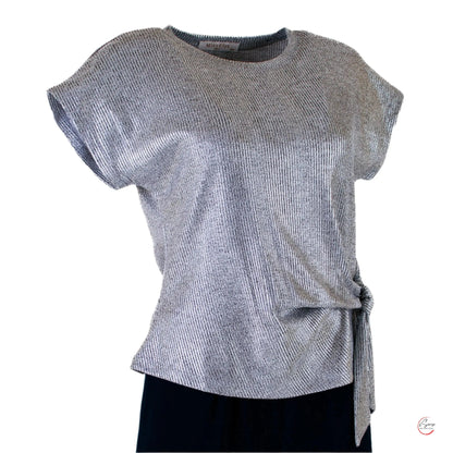 ✨ Осмели се да блеснеш със сребристия топ, който привлича погледите! ✨