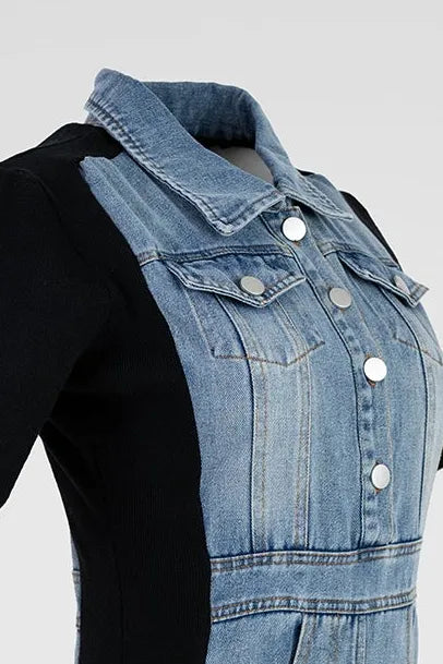 Stylish denim midi dress with black elastic side panels, silver buttons, and classic collar.